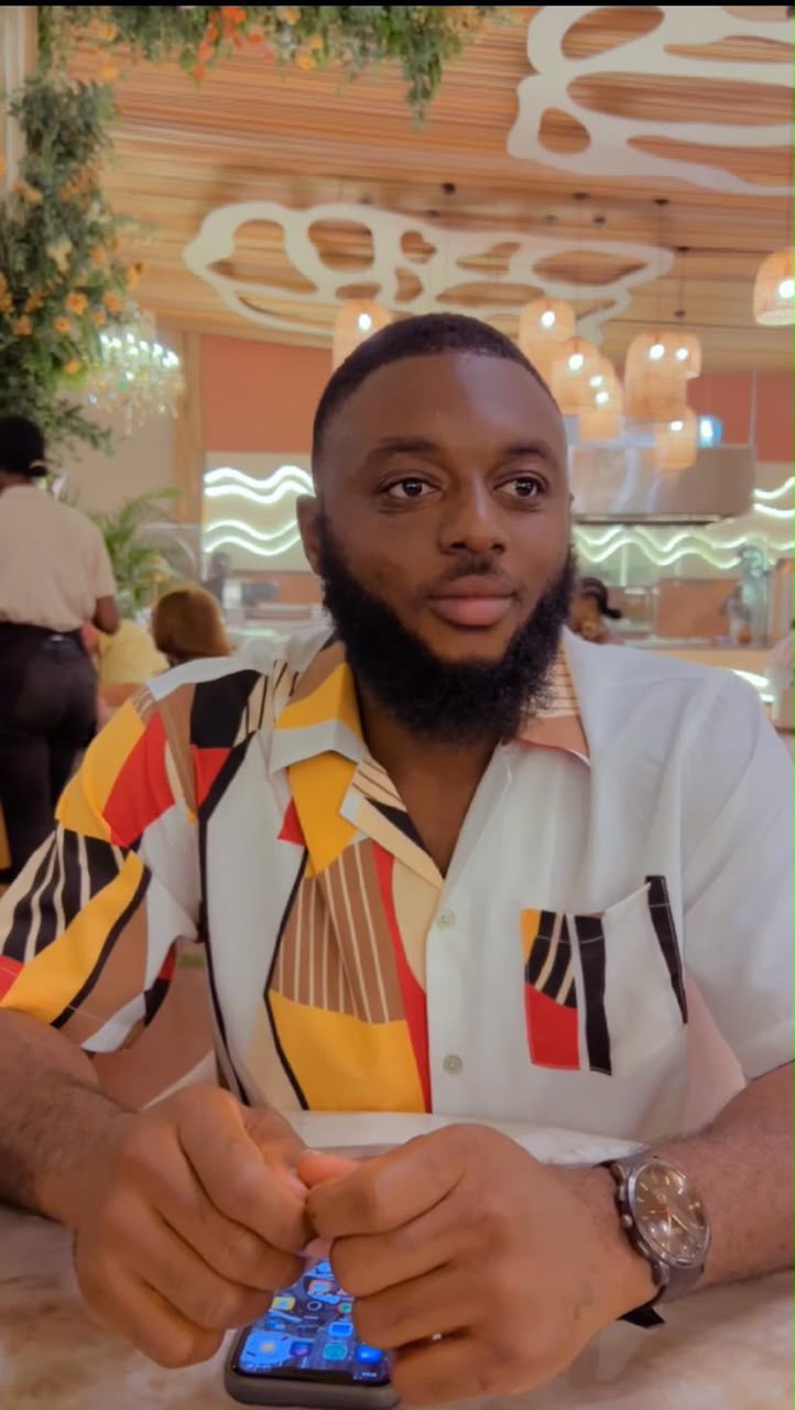 Diwura Abdul Hakim, Chief Operations Officer of Chims Eagle Eye, seated in a patterned short-sleeve shirt